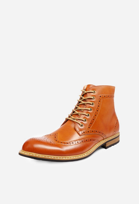 Botines clásicos wingtip con cremallera lateral de hombre
